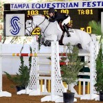 Margie Engle and Indigo were the winners of the $50,000 Grand Prix of Tampa CSI 2*-W after completing a clear round over the fences, but crossing the finish line with two time faults. Photo By: Anne Gittins.