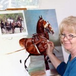Equestrian artist Moe Hahn works on a painting of the combined driving horses that are part of Chester Weber’s famous and award-winning four-in-hand team.