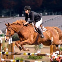 Lisa Goldman makes the jumping look effortless in the irons of Morocco last fall