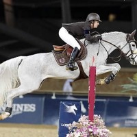 Laura Kraut sealed the third place rank in the Longines Global Champions Tour Series aboard Cedric during the Doha 2013 CSI5*