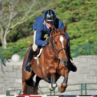 Devin Ryan and Chantilly clear a fence in the $5,000 Open Jumper Welcome on their way to the win. Flashpoint Photography.