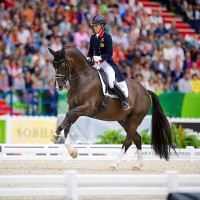 Dressage world number one Charlotte Dujardin (GBR) and Valegro claimed double gold at the Alltech FEI World Equestrian Games™ 2014 in Normandy (FRA). (FEI/Arnd Bronkhorst)