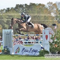 Andy Kocher and Heliante clear the Beau Rivage jump before a packed house in Sunday's $77,700 Governor's Cup Grand Prix.