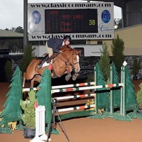Kocher pilots his own Red Lady to the win in Thursday's $5,000 Horseflight Open Welcome