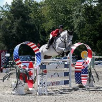 ©ESI Photography. Lauran Linback and HH Dauphin on their way to a win in the $25,000 Junior/Amateur-Owner Jumper High Classic