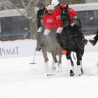 Juan Bollini (2) keeps possession of the ball with teammate Melissa Ganzi (1) and Nacho Figueras (3) of St. Regis close behind