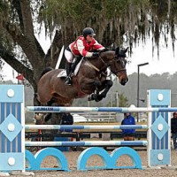 ©ESI Photography. Jacqueline Steffens pilots Quercus Van Generhese to the top of the $5,000 U-Dump Junior/Amateur-Owner High Jumper Classic