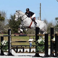 ©ESI Photography. Haley Gassel and Werner 61 jump to the blue in the $7,500 U-Dump/SJHOF Amateur-Owner High Jumper Classic