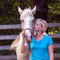 Bridget Kroger and her horse Dusty of Wounder Warrior's Equestrian Program