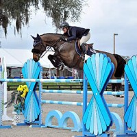 ©ESI Photography. Callan Solem and Cortender jump to a win in the $2,500 Brook Ledge Open Welcome