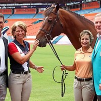 Margie Engle and Dolphins Hall of Famer Bob Griese, right, with Jimmy Torano and Olympic Gold medalist Beezie Madden at Sun Life Stadium
