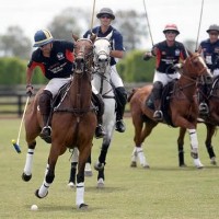 Frank Galdon of Gordon W. Ross Team ReMAX controls the ball despite defense from pro Nic Roldan of RBC Wealth Management.