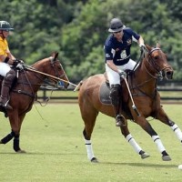 Dan Haynia of RBC Wealth Management drives downfield with the ball.