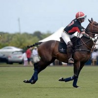 Gordon W. Ross of Team ReMAX scores a goal off a neck shot