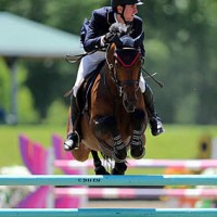 ©ESI Photography. Michael Hughes and Luxina jump to a win in the $10,000 Junior Amateur-Owner Jumper High Classic