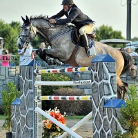 Derek Petersen and Cassevel fly over the Six Bar challenge. Flashpoint Photography.