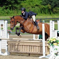 ©ESI Photography. Lena Reeb and Call Me jump to a win in the $1,500 Platinum Performance Hunter Prix