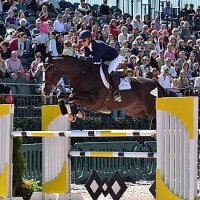 Candice King riding Bellissimo LLC's Kismet 50 was the first rider on course and the first clear round for the inaugural Grand Prix