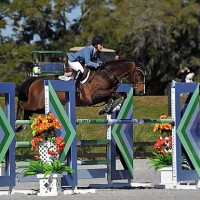 (c) ESI Photography. Laura Linback and Woodrun's Whittaker MVNZ win the $7,500 U-Dump Jr/A-O Jumper Classic High.